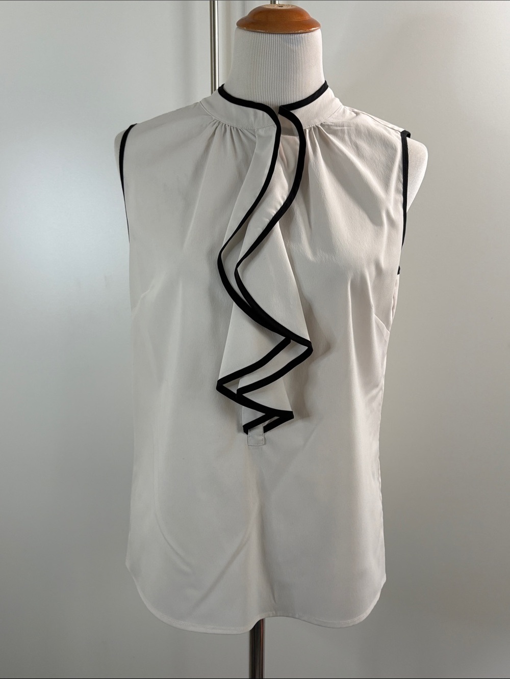 Sleeveless Ivory Ruffle-Front Top with Black Trim M